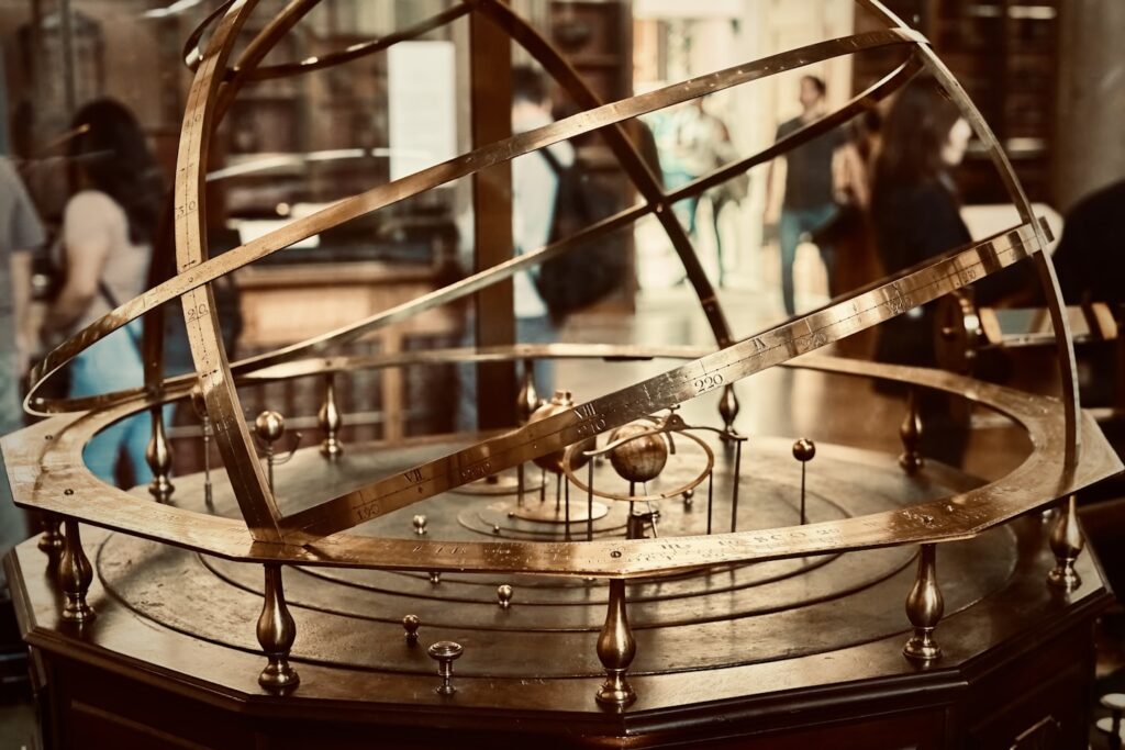 a large metal object sitting on top of a wooden table