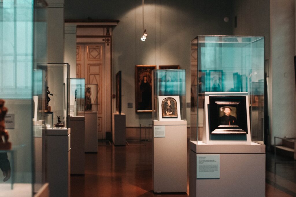 a museum filled with lots of glass cases